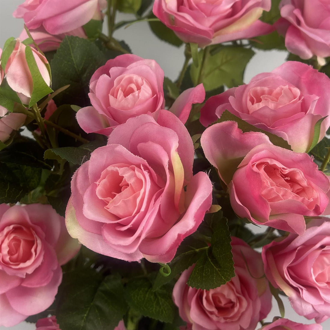 60cm Premium Rose Bush Pink Silk Flowers and Leaves styled in a room — Botanik artificial plants